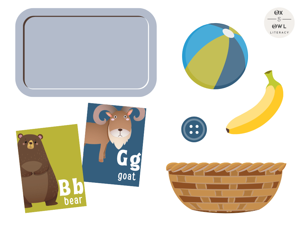Graphics of materials needed for playing Phonics Treasure Hunt showing a tray, a couple letter cards, basket, banana, ball, and button. 